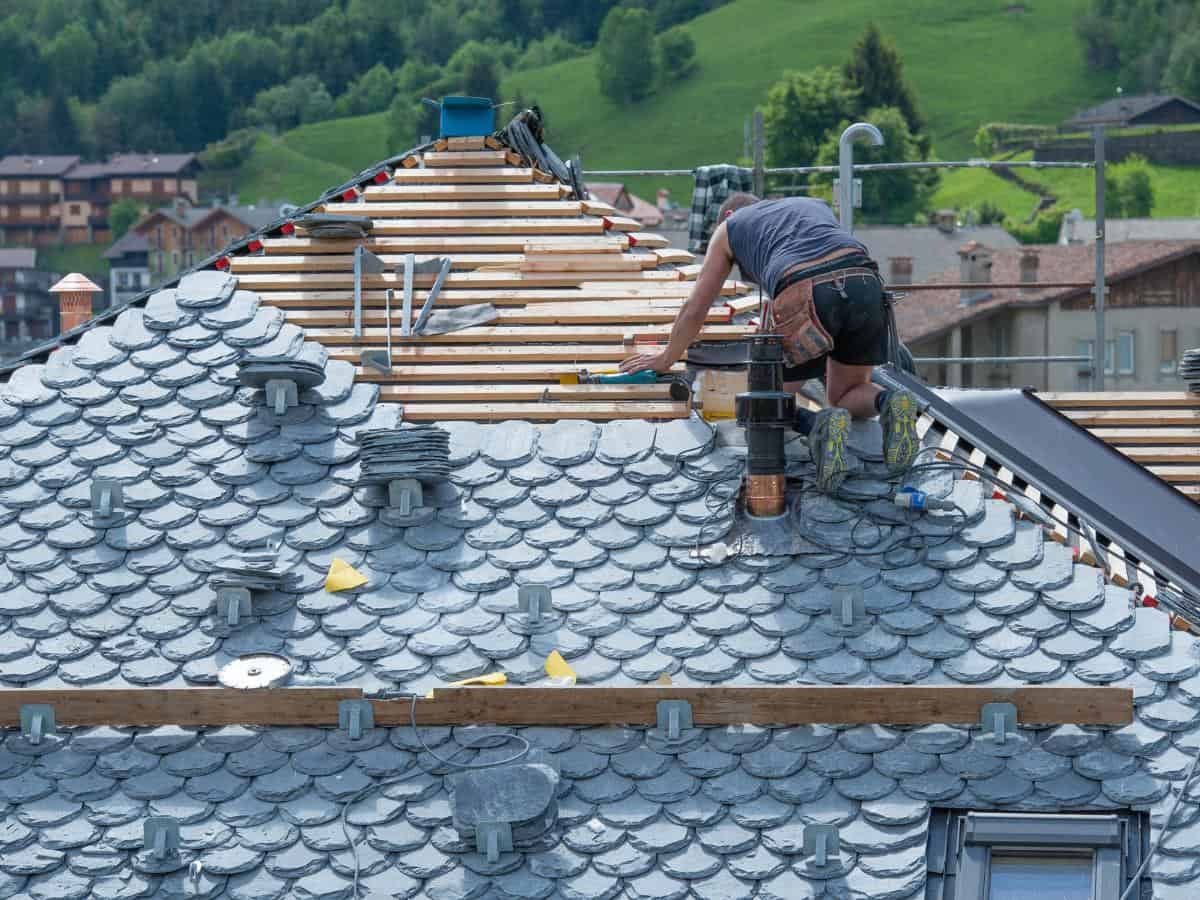 Roofer working on a residential roof