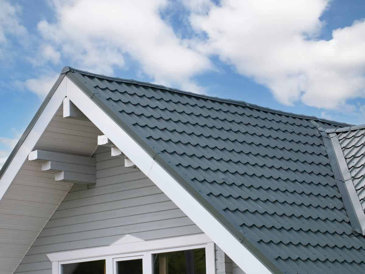 Gable roof with metal tile panels on a residential home