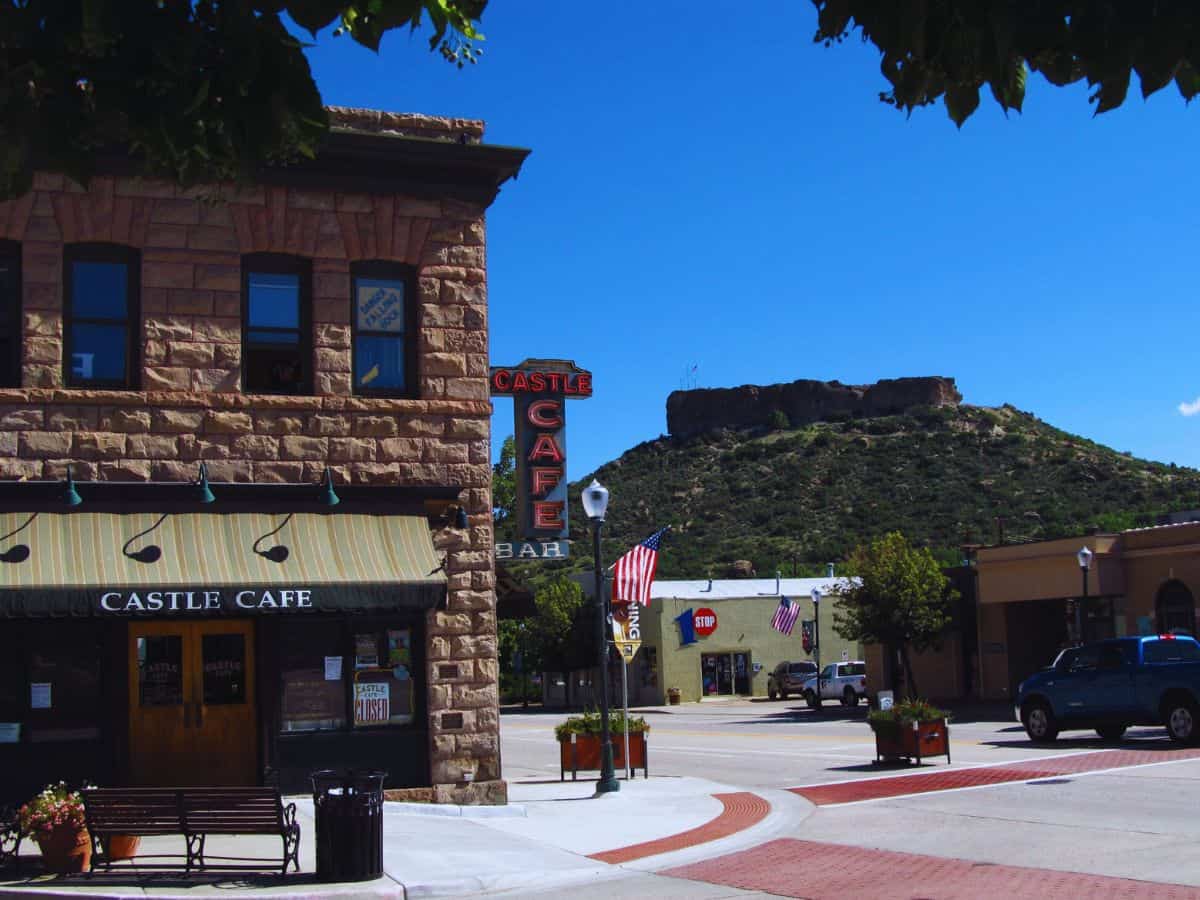 Castle Cafe in Douglas County with mountain view and clear blue sky.