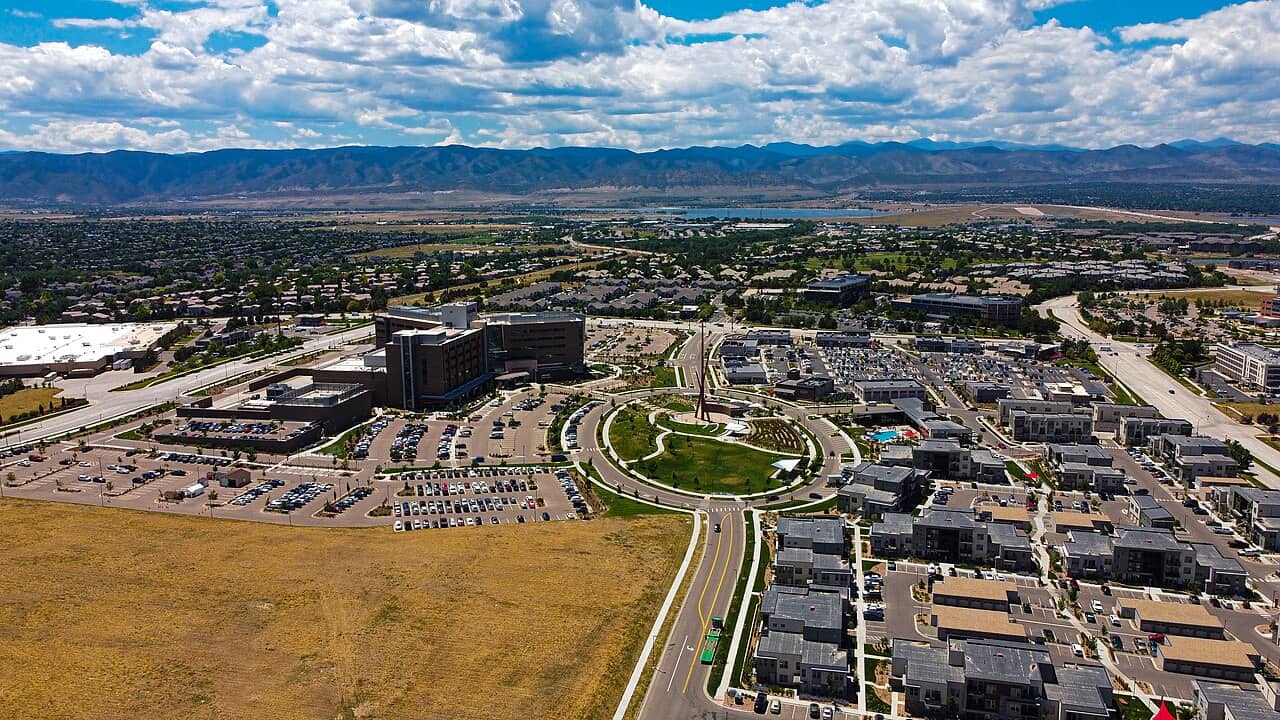 Aerial view of Douglas County, CO with commercial buildings and parking lots.