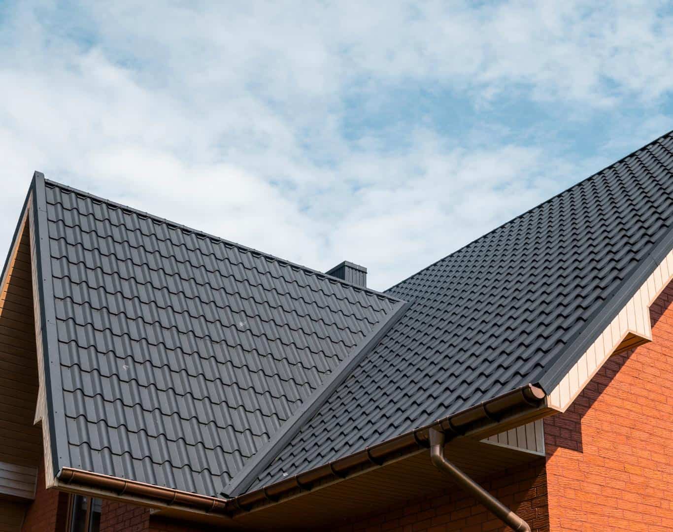 Dark metal tile roof on a residential home